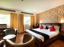 Capital O 46644 Hotel Armani, hotel v destinaci Kottayam