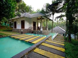 OYO 10233 Century Village Resort, hotel v destinaci Mananthavady