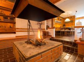 La Casa di Michela - 120m2 in the mountains with fireplace & garden，Strigno的度假屋