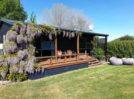 Fairway Cottage, hotel com estacionamento em Oamaru