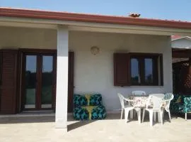 2 bedrooms house with enclosed garden and wifi at Is Potettus