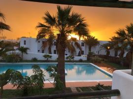 Casa Neem - Duplex 2ch dans village naturiste, cheap hotel in Charco del Palo