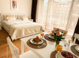 Pirin Golf Studio Apartment, hotel in Razlog