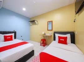 OYO 44016 Rafik Ali Motel, hotel u gradu Kepala Batas