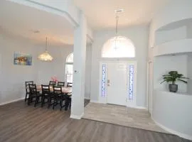 Sunset Bay Beautiful Pool Home - Bring Your Boat or Jet Ski - Canal with Dock- Sleeps 10 - 4 BD