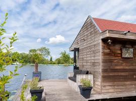 Aangenaam op de Rijn, woonboot, inclusief privé sauna, ubytování na lodi v destinaci Alphen aan den Rijn