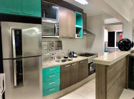 Spazio Felicita, Indaia, Bertioga, apartamento pé na areia โรงแรมในเบอร์ทีโอกา