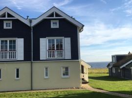 Ferienhaus Oceanview, hotel with hot tubs in Sierksdorf