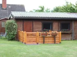 Haus Seerobbe-Blockhaus im Garten