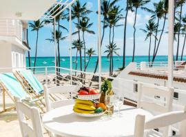 TROPICAL VILLAGE playa LOS CORALES, hotel en Punta Cana