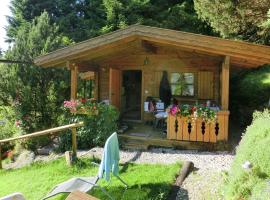 Log cabin in Bavaria with covered terrace, holiday home in Steingaden