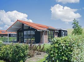 Comfortable holiday home nearby Oosterschelde, allotjament vacacional a Kattendijke