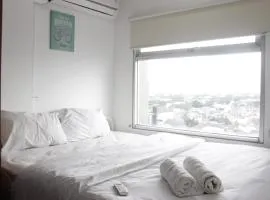 2BR Apartment Grand Asia Afrika near Alun-alun Bandung By Travelio