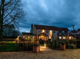 The Three Horseshoes, bed and breakfast en Briston