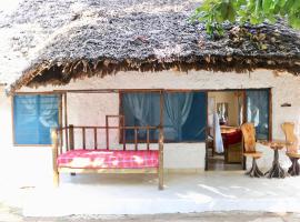 Room in Guest room - A wonderful Beach property in Diani Beach Kenya - A dream holiday place, Cama e café (B&B) em Mombasa