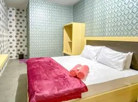 Tini's Guest House Malang Mitra RedDoorz