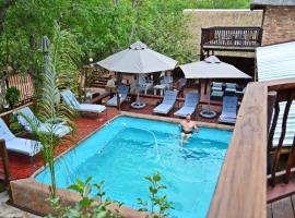 Pan African Lodge & Safari, מלון ליד Lionspruit Game Reserve, מרלות' פארק
