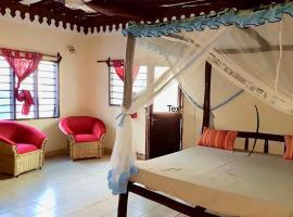 Room in Guest room - A wonderful Beach property in Diani Beach Kenyaa dream holiday place, homestay in Mombasa