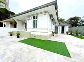 Gurney Treasure - The Vintage Villa by Little Cabin, chalet di George Town