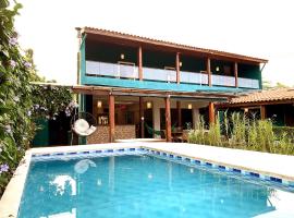 Refúgio Perfeito - Conforto, Piscina e Praia!, Hotel in Camburi