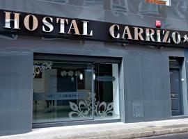 Hostal Carrizo โรงแรมที่มีที่จอดรถในเอลดา