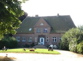 Ferienwohnungen Hof Loestrup, фермерський будинок у місті Sörup