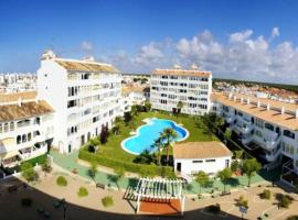 Modern apartment with pool in the heart of El Portil, hotel in El Portil