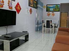 Privāta brīvdienu naktsmītne YITOM Homestay易通民宿 pilsētā Sungai Besar