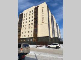 Новая квартира в новом доме, hotel with parking in Karagandy