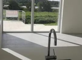 Hus med søudsigt