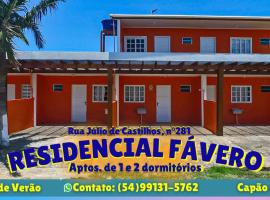 RESIDENCIAL FÁVERO, casa rústica em Capão da Canoa