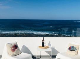 CASA ANCLADA en LA SANTA- 4 Apartamentos frente al mar- 1ª linea solarium