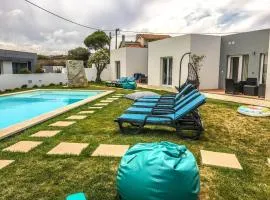 4 bedrooms house with shared pool enclosed garden and wifi at Atalaia 3 km away from the beach