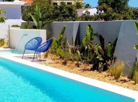 Modern apartment in Estói with shared pool.