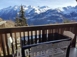 Les Iris T2 station Alpe Huez, hotel u blizini znamenitosti 'Auris-Express Ski Lift' u gradu 'Auris'