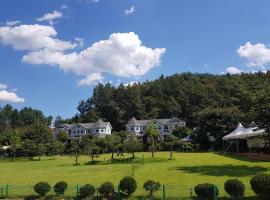 Tomato Pension, cabaña o casa de campo en Hongcheon