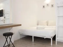 Modern Chic Studio Room at Grand Asia Afrika Apartment By Travelio