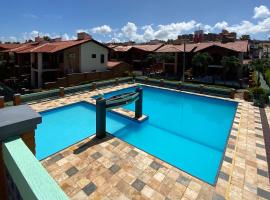 Linda casa Porto das Dunas: 4 su&iacute;tes, churrasqueira e piscina