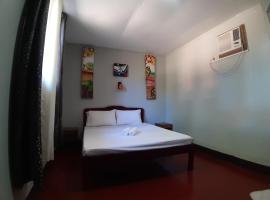 OYO 671 Natua's Cabin, hotel in Puerto Princesa