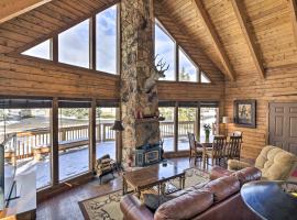 Rustic Village Lake Cabin Escape with Deck and Grill!, hotel in zona Chimney Rock National Monument, Pagosa Springs