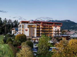 Hotel Olympia, hotel con campo de golf en Brunico