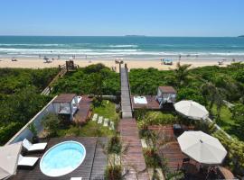 Hospedaria Home Suites Mariscal, beach hotel in Bombinhas