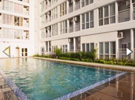 Apartemen Taman Melati Margonda by Winroom, Hotel in Kukusan