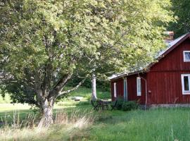 Lilla Halängen cottages, cabana o cottage a Dalskog