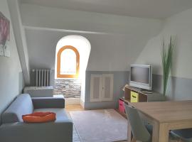 Appartement cosy pour une pause sereine et chaleureuse, hotel em Le Mont-Dore