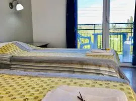 Room in Apartment - 2 Bedroom Apartment, with Swimming Pool, two steps from the beach