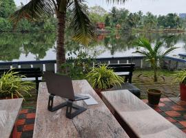 Muralee's Riverside Villa in Kochi, cottage in Cochin