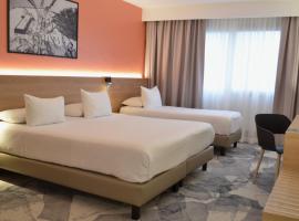 Hotel des Congrès، فندق في فيليوربان