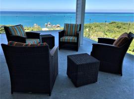 Turquoise Views at Coral Views Village, cabaña o casa de campo en French Harbor