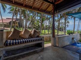 Rakuen Beach Villa, familiehotell i Hikkaduwa